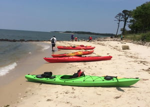 4 kayaks on the beach