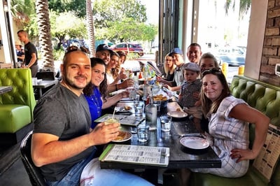 Group of adults enjoying a food tasting