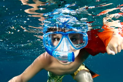 Little boy snorkeling