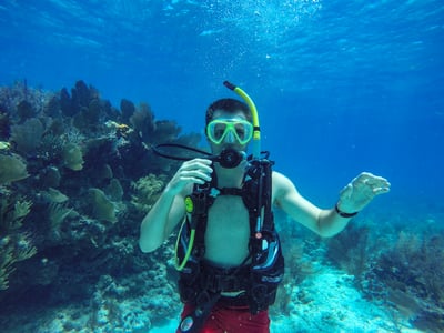 Man exploring underwater Key West while scuba diving