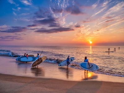 Paddleboarding at sunset