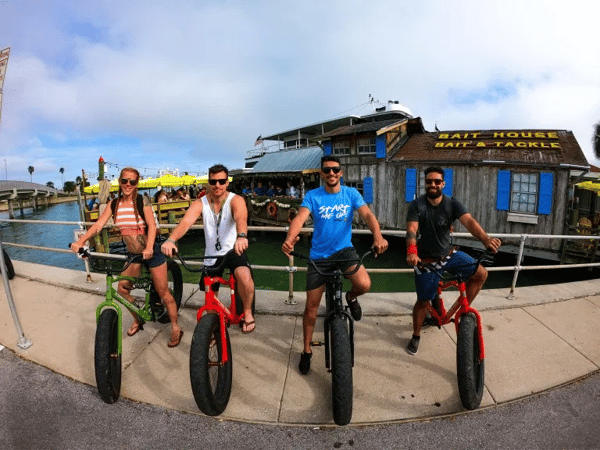 4 people riding fat tire bikes