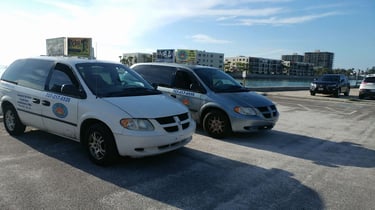 Two mini vans in St Pete Beach