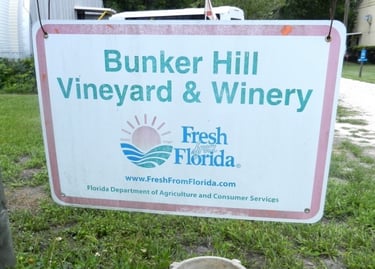 White and Pink Sign for Bunker Hill Vineyard & Winery