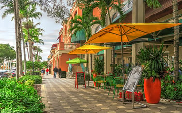 Yellow and green outside umbrellas in downtown Naples