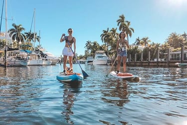 Two people paddle boarding in Fort Myers