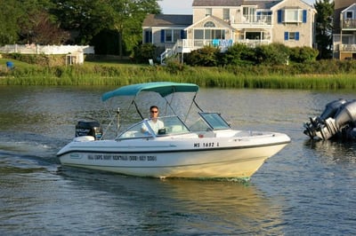 green and white boat for rent in cape cod