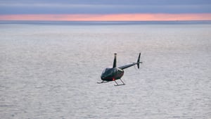 helicopter in sarasota over the sunset