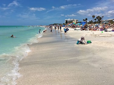 kid digging in the sand in sarasota