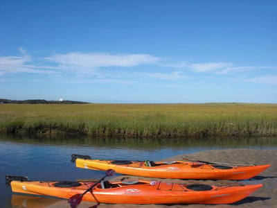 orange canoes on cape cod