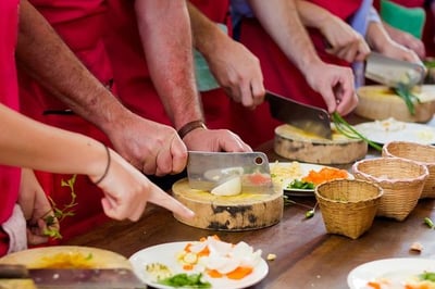 people learning how to cook mexican food