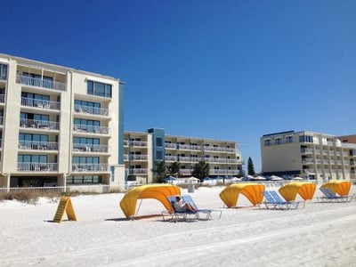 yellow beach chairs on the beach