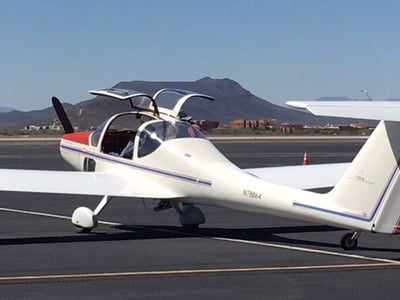 small white plane for 2 people