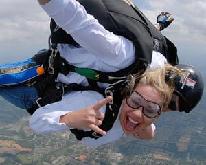 two people sky diving