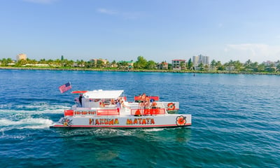 white and orange catamaran boat on the ocean