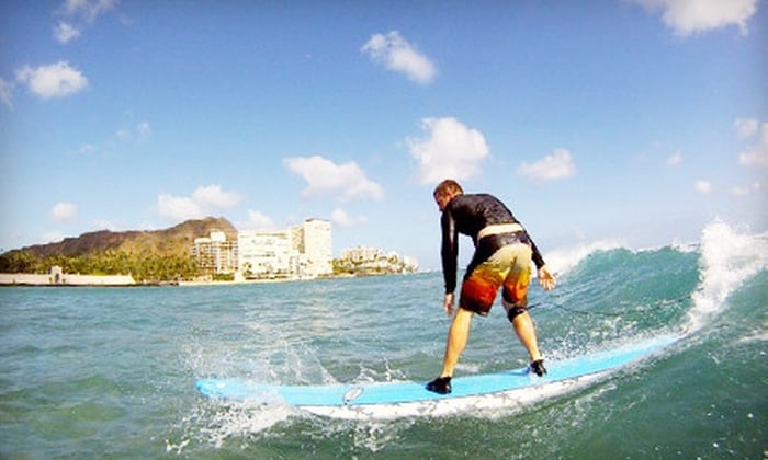 Boy surfing in Oahu