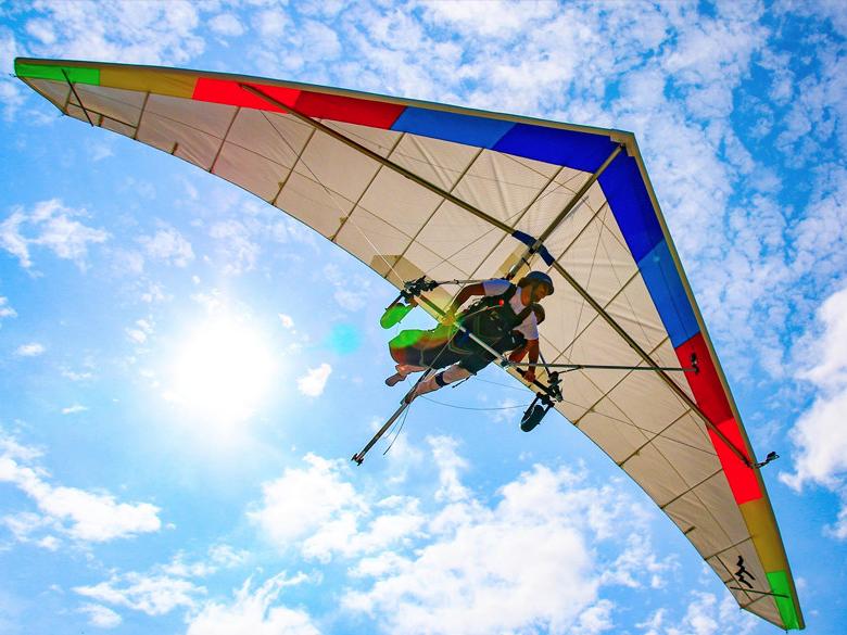 man hang gliding in the middle of the sky in Nashville