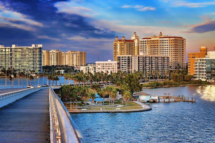 building, bridge, and water in Sarasota at sunset