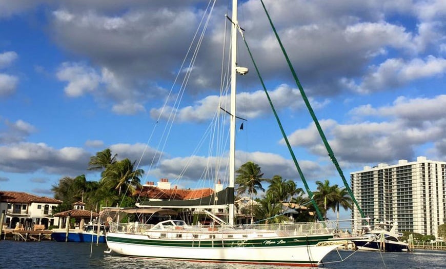 green and white sail boat in Boca Raton