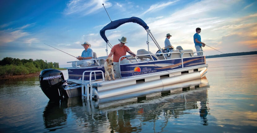 pontoon boat in Fort Myers with men fishing off it