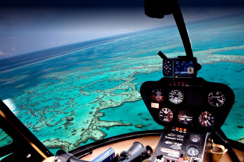 view from inside helicopter over playa del carmen